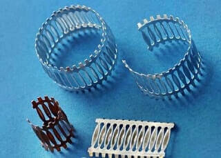 Torsion spring contacts
